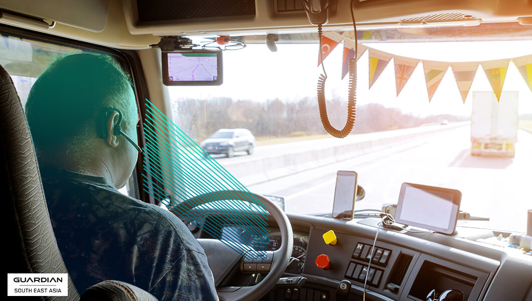 man driving using monitoring system