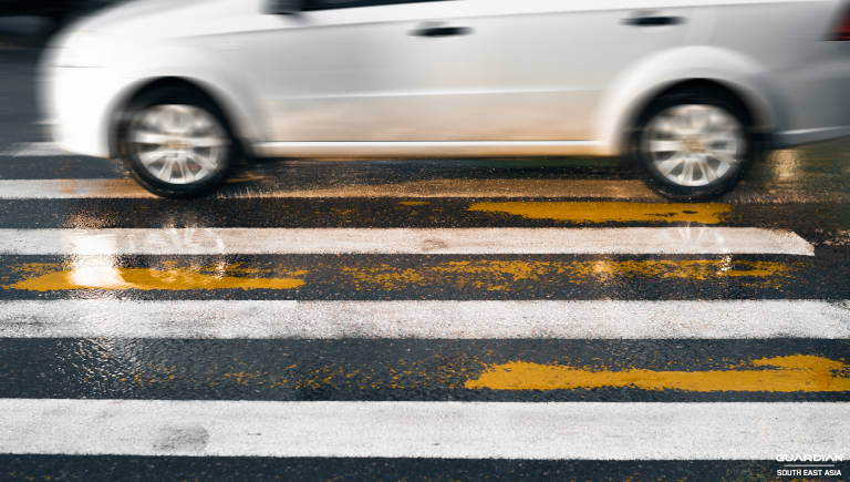 moving car on pedestrian lane