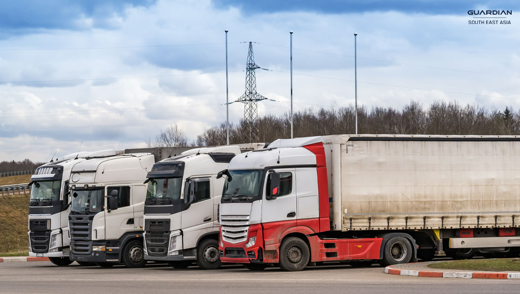 four parked trucks